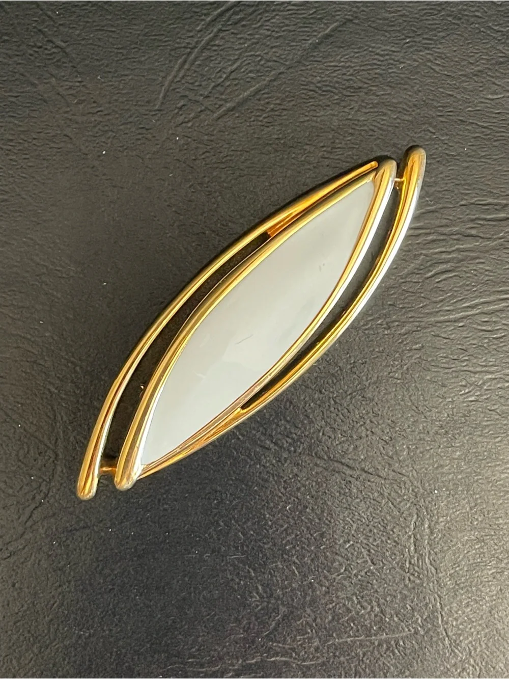 Vintage Monet Gold Tone & color enamel Marquise brooch.
